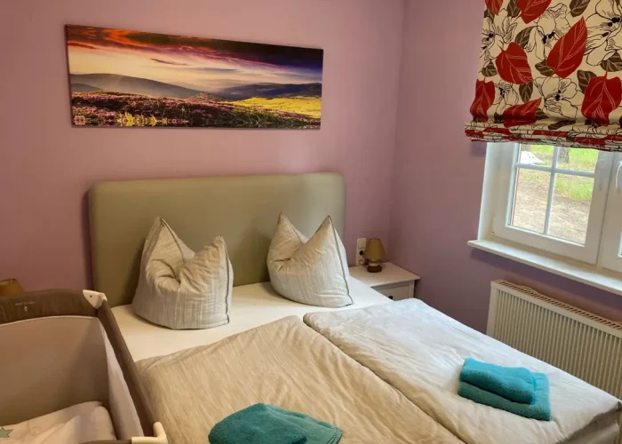 Ferienhaus Specht Schlafzimmer Doppelbett